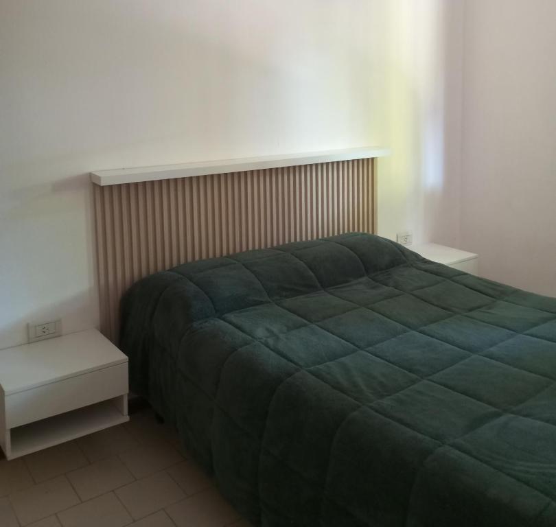 En eller flere senge i et værelse på La Casa del Barrio