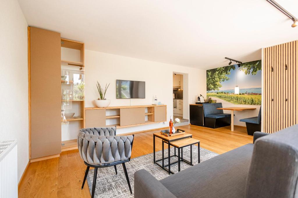 TV a/nebo společenská místnost v ubytování SEEZEIT Residence