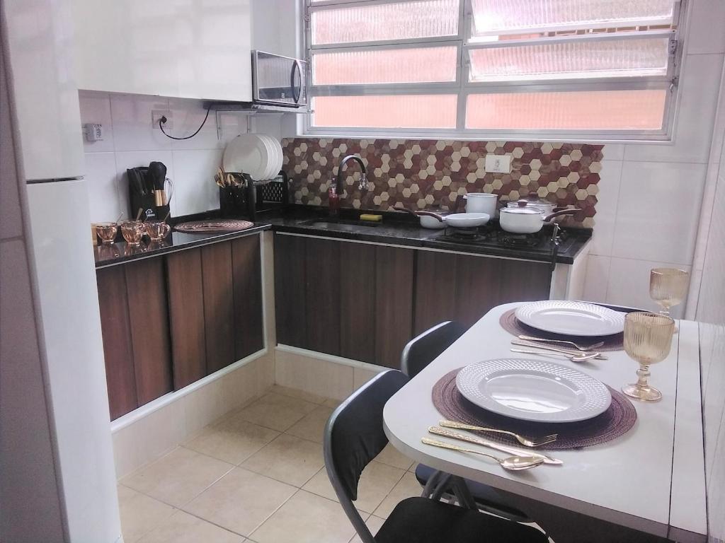 Køkken eller tekøkken på Marinhos Apartment - Guarujá