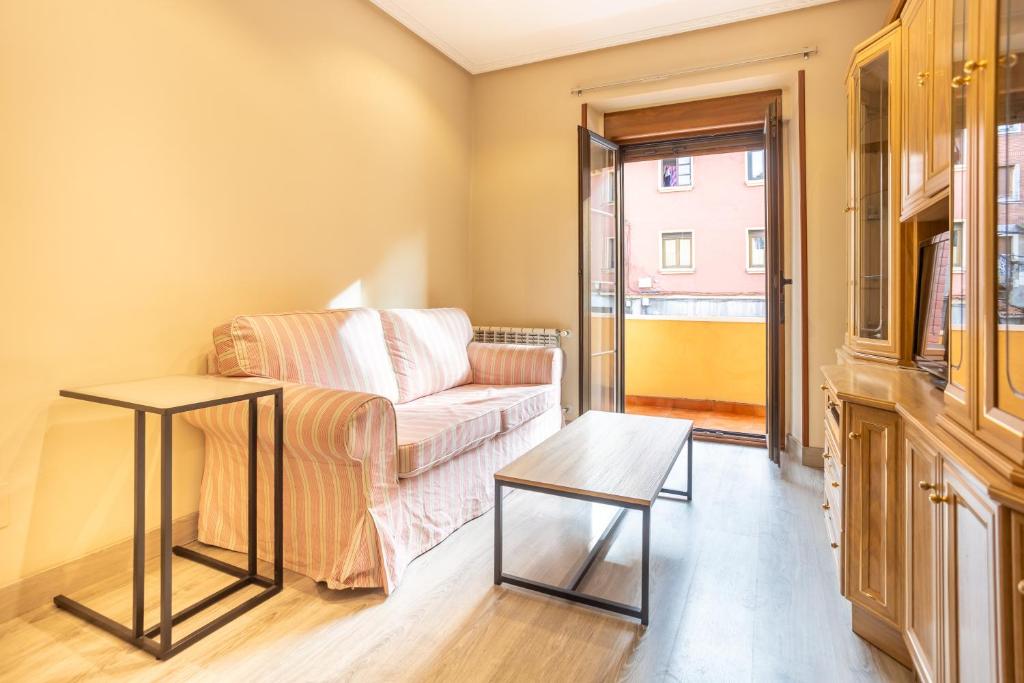 En eller flere senge i et værelse på Your Cosy Home in Figaredo