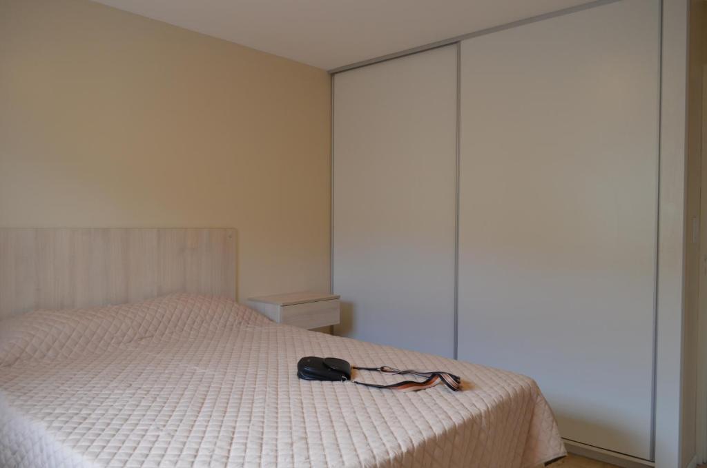 Postel nebo postele na pokoji v ubytování Happiness Suite