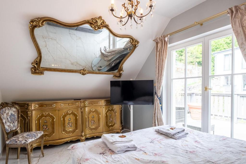 En eller flere senge i et værelse på Haus Saxonia