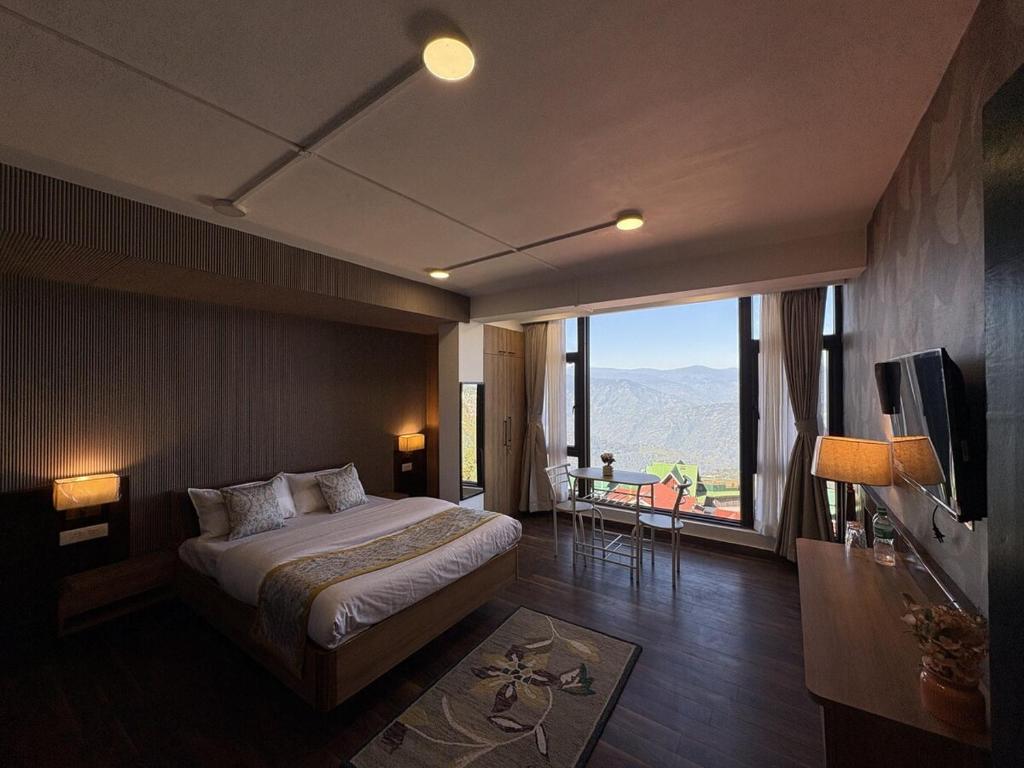 En eller flere senge i et værelse på Cloud Studio by The Erina House