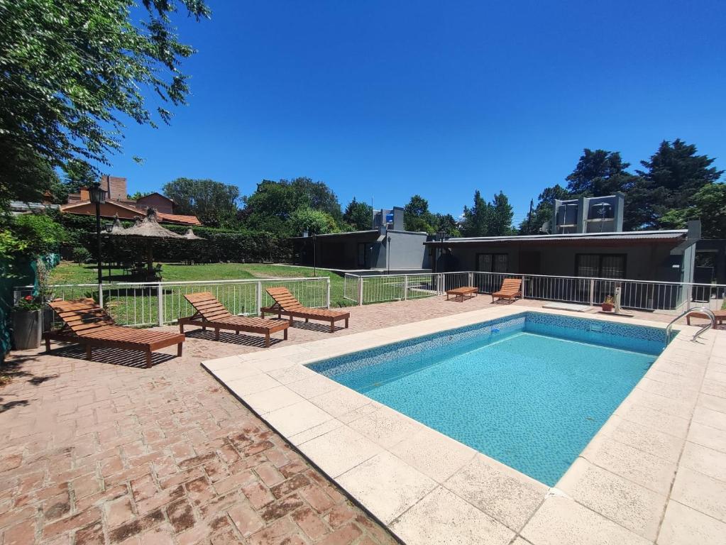 Swimmingpoolen hos eller tæt på Cabañas De Lourdes