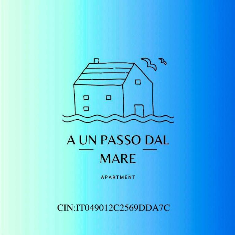 a house in the water with birds on a blue background at A un passo dal mare! in Piombino