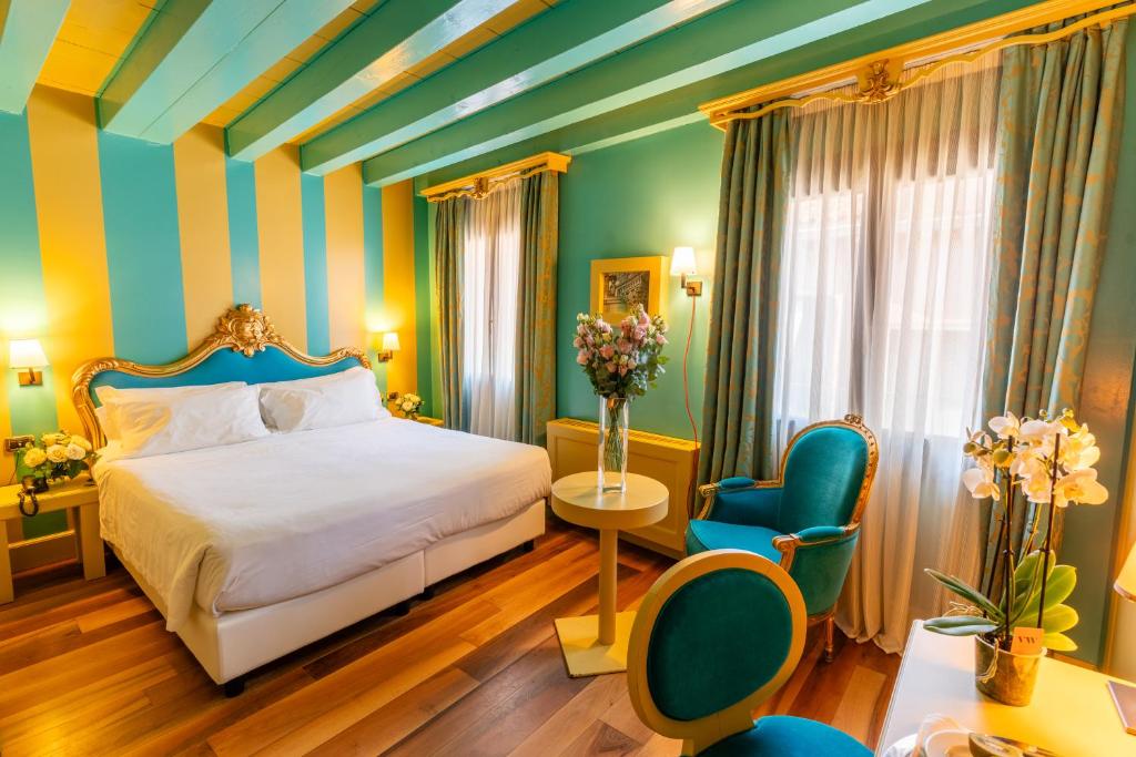 En eller flere senge i et værelse på Hotel Ca' Zusto Venezia