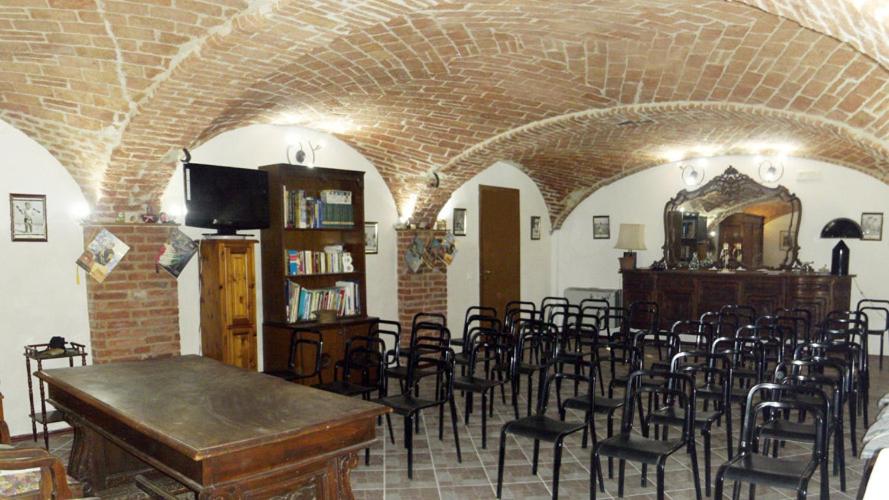 Televízia a/alebo spoločenská miestnosť v ubytovaní Casa Tavasso