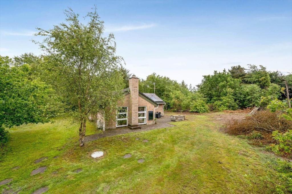 an old brick house in the middle of a field at 20832-Tim-Alrum-1 in Alrum