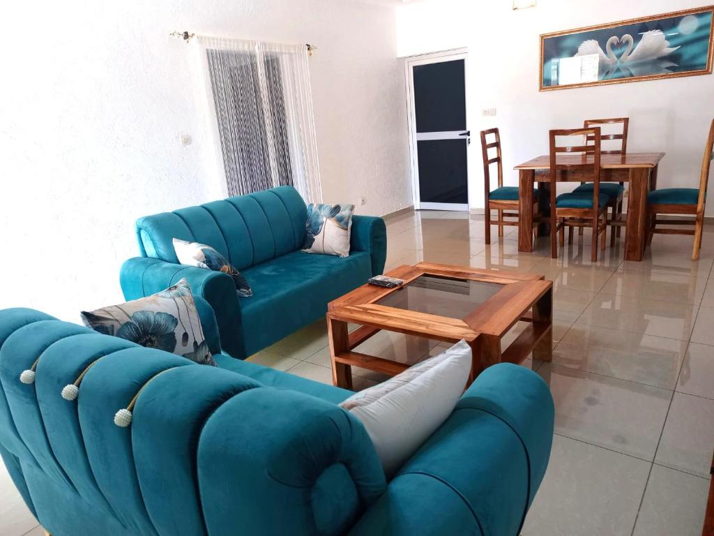 Posezení v ubytování Appartement 2 à 3 pièces Tout Confort Paisible - Swan