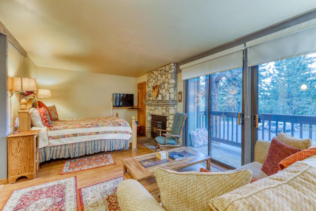 a living room with a view of a balcony at Hidden Valley 29 D in Mammoth Lakes