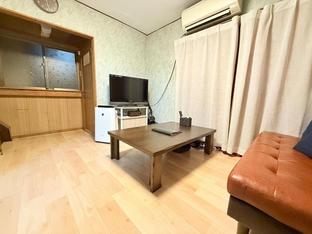 Et tv og/eller underholdning på Okayama Urban Peach