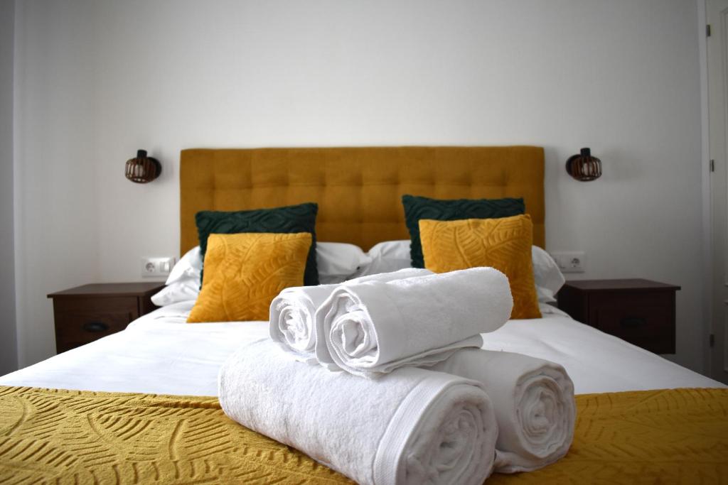 En eller flere senge i et værelse på El Rincón de la Jara