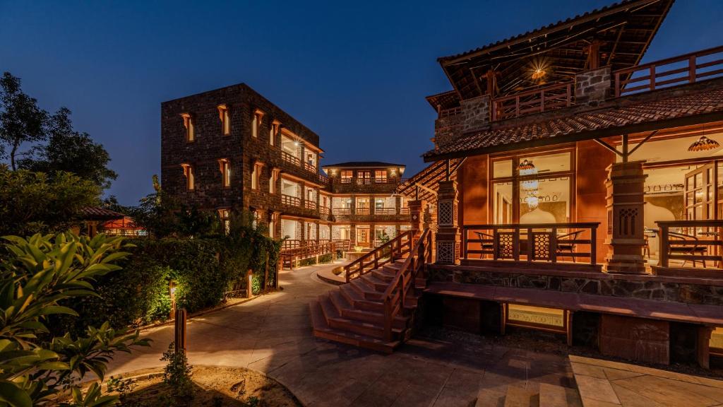 an exterior view of a building at night at SeraiBagh Resort in Khilchipur