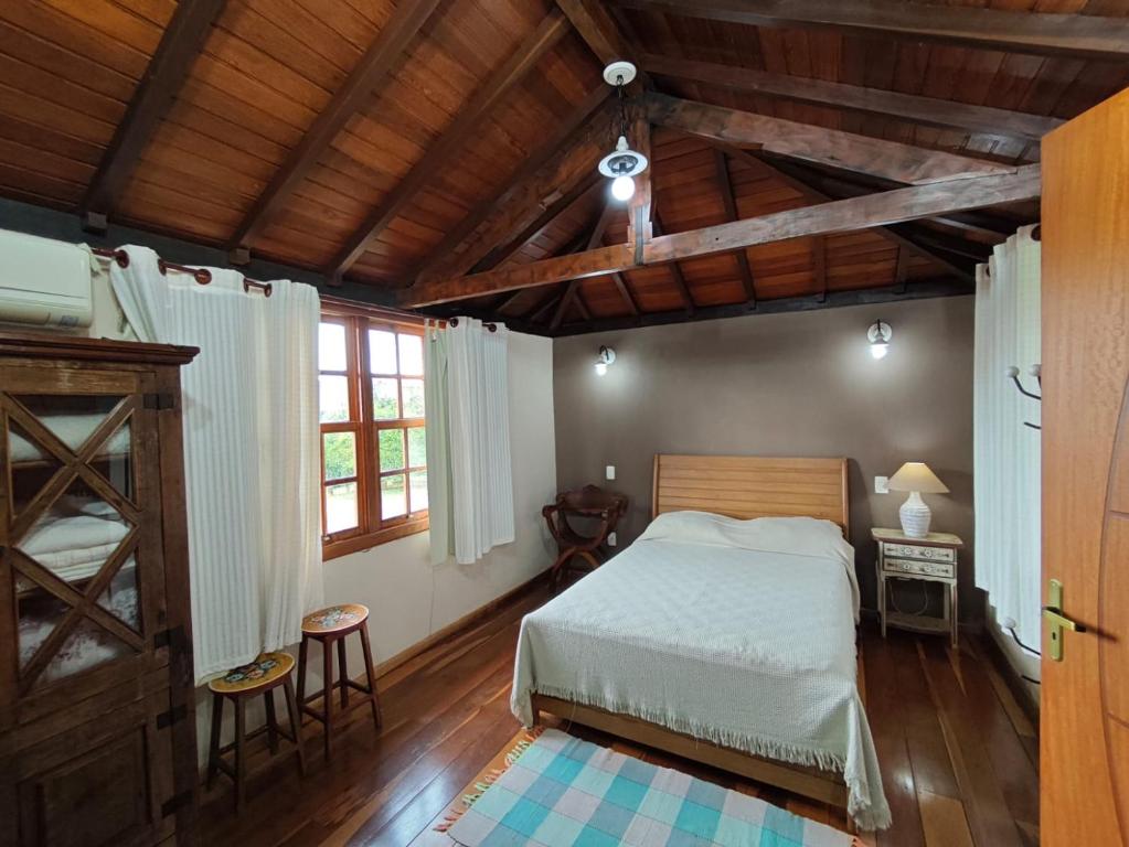 Postel nebo postele na pokoji v ubytování Recanto do Sitio