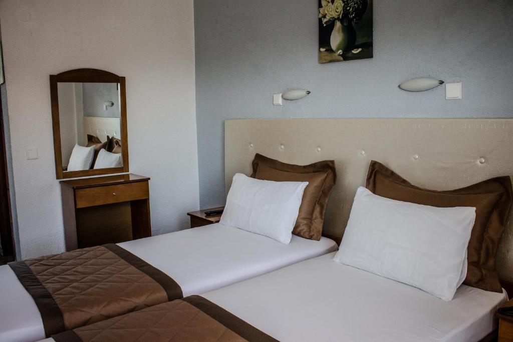 Posteľ alebo postele v izbe v ubytovaní Hotel Ilios