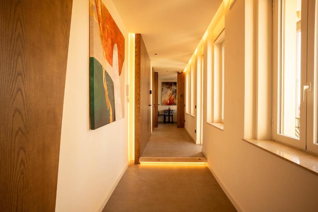 a hallway of a house with windows and a hallwayngth at Sicilias in Catania