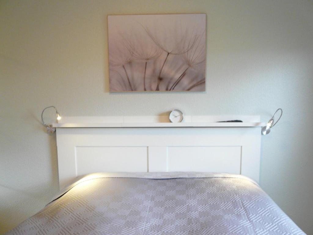 Ένα ή περισσότερα κρεβάτια σε δωμάτιο στο Ferienhaus nah an Wald & See