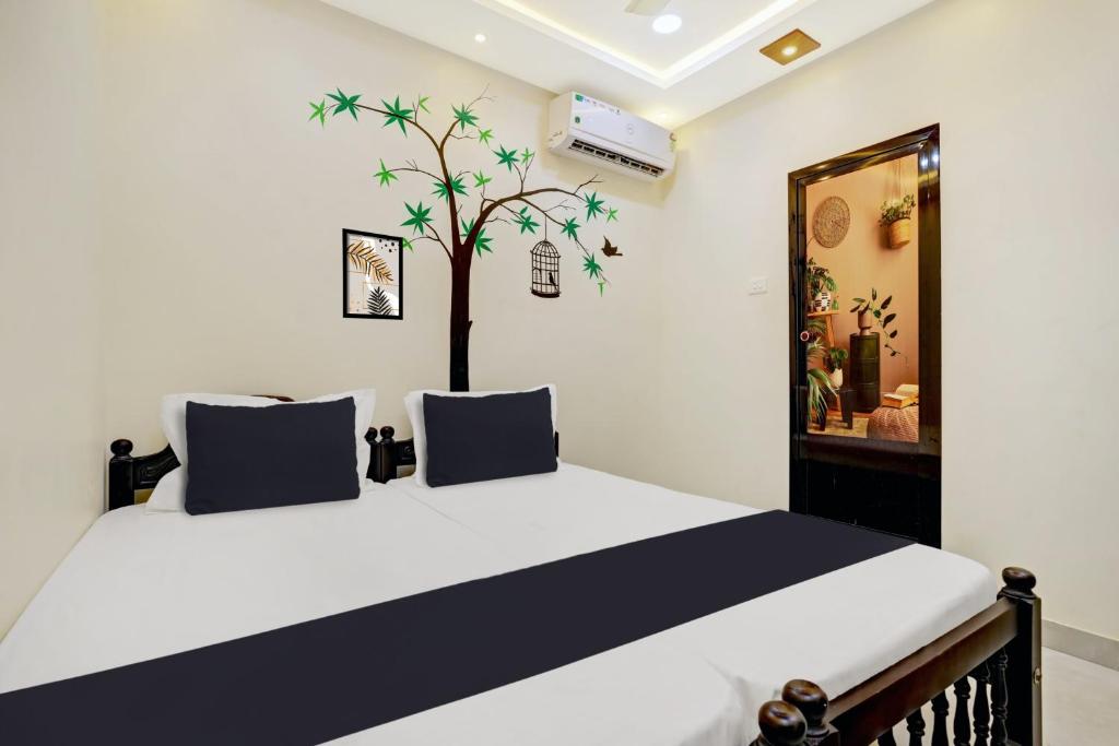 Postel nebo postele na pokoji v ubytování Hotel O PULARI BACKWATER & ROOMS