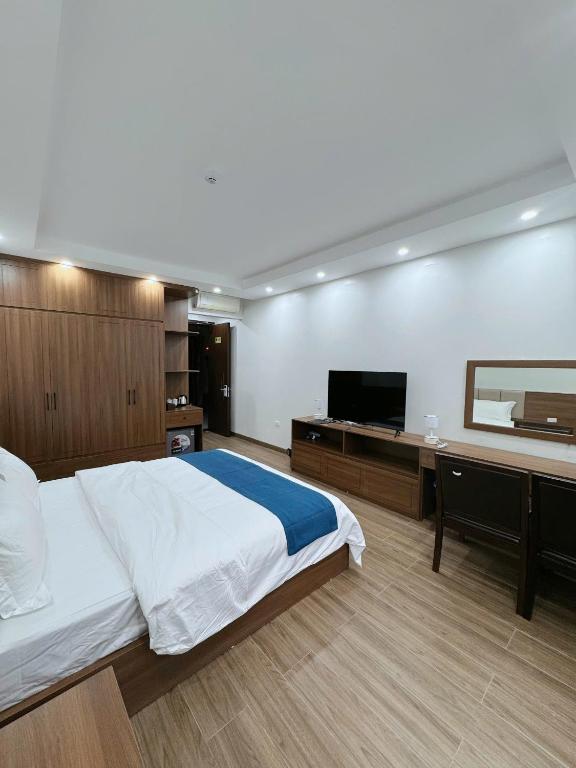 En eller flere senge i et værelse på Chenghotel