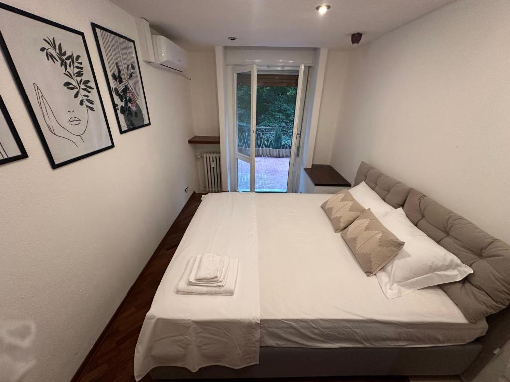 En eller flere senge i et værelse på B&B Olimpia