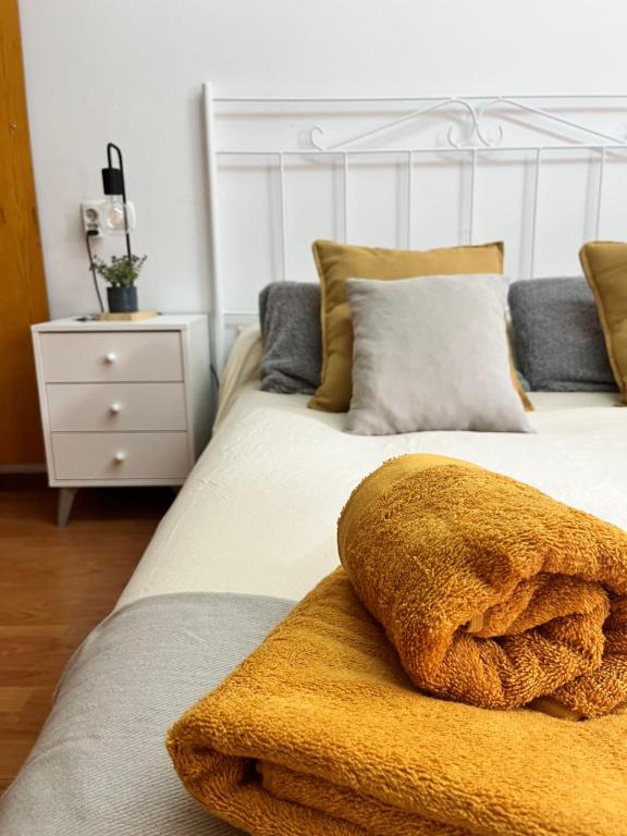 En eller flere senge i et værelse på Castle House Xativa