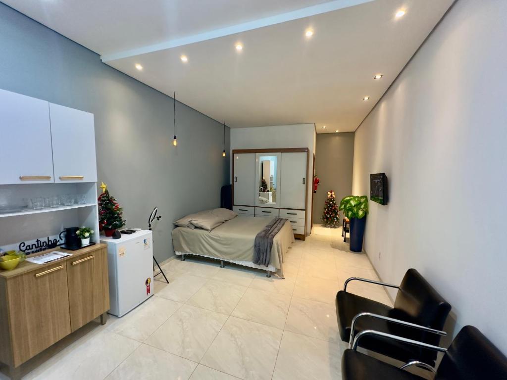 Et tv og/eller underholdning på Stúdio Prox Centro Garagem Privado