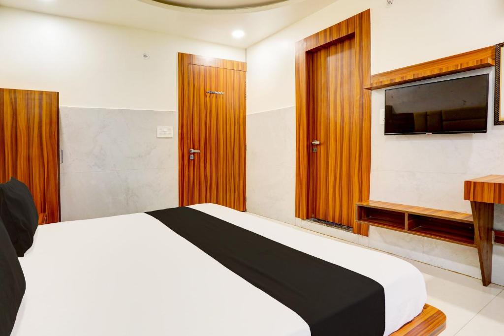 Giường trong phòng chung tại Hotel O Dev paradise