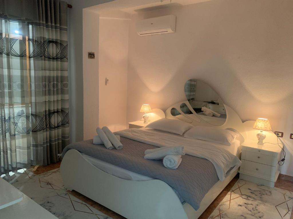 Ένα ή περισσότερα κρεβάτια σε δωμάτιο στο Fabio's Apartament