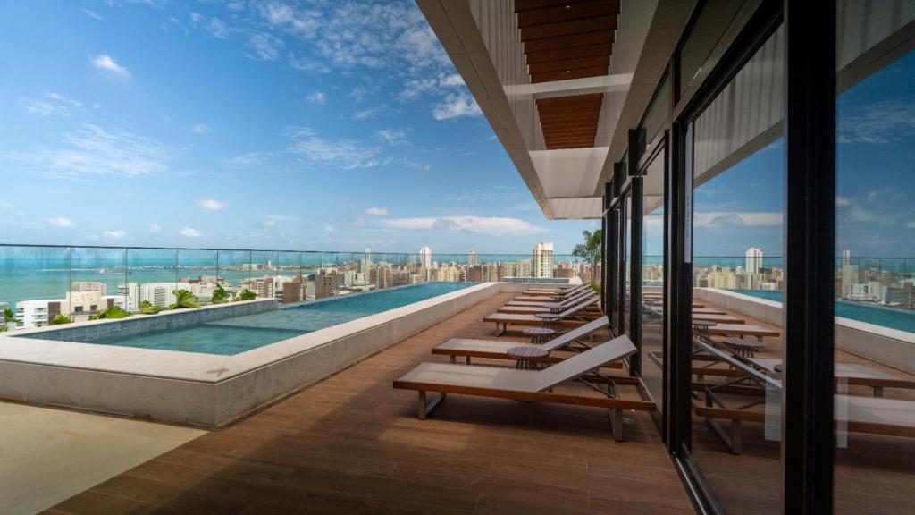 En balkon eller terrasse på Exclusividade e Conforto a 500m da Beira-Mar