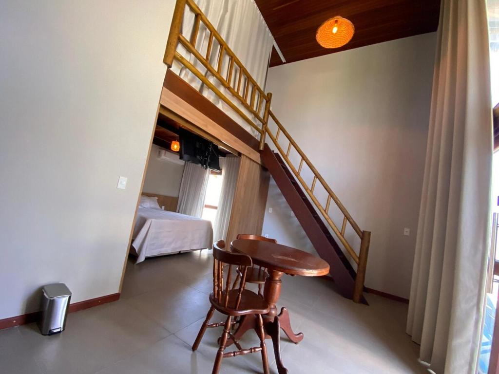 En eller flere senge i et værelse på Bangalo beira-mar Praia do Frances