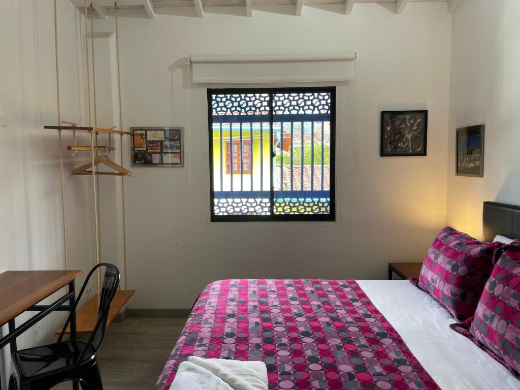 Postel nebo postele na pokoji v ubytování Hotel Casa Azul Jardín