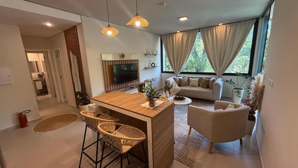 a living room with a couch and a table and chairs at Escapada Premium en San Bernardino! Toledo House in San Bernardino