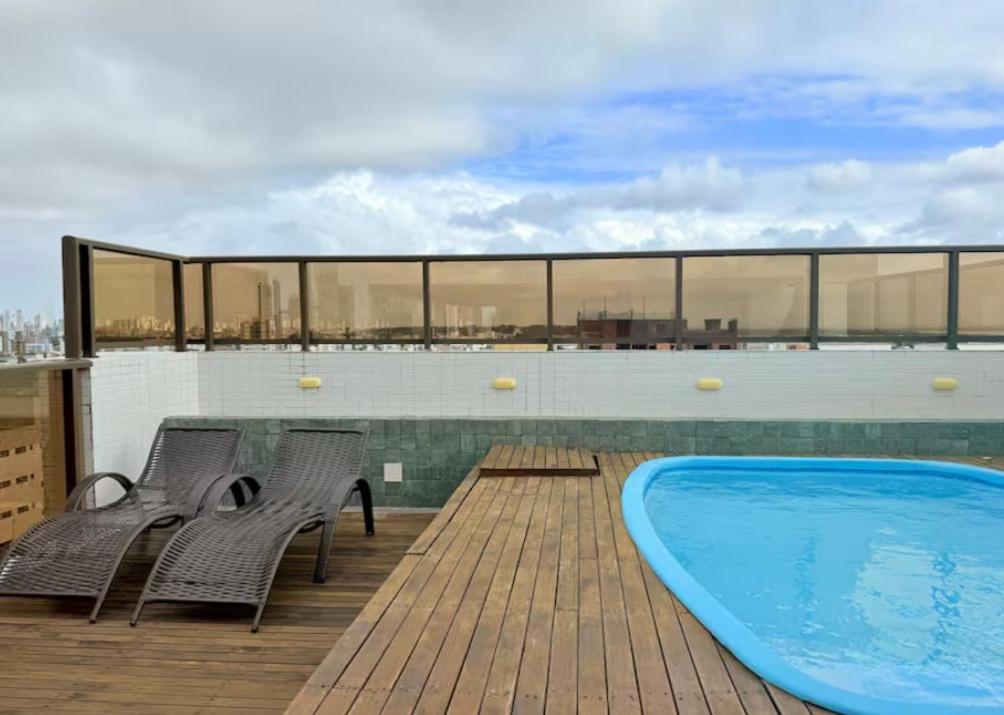 Swimmingpoolen hos eller tæt på Villagio Intermares Home Flat