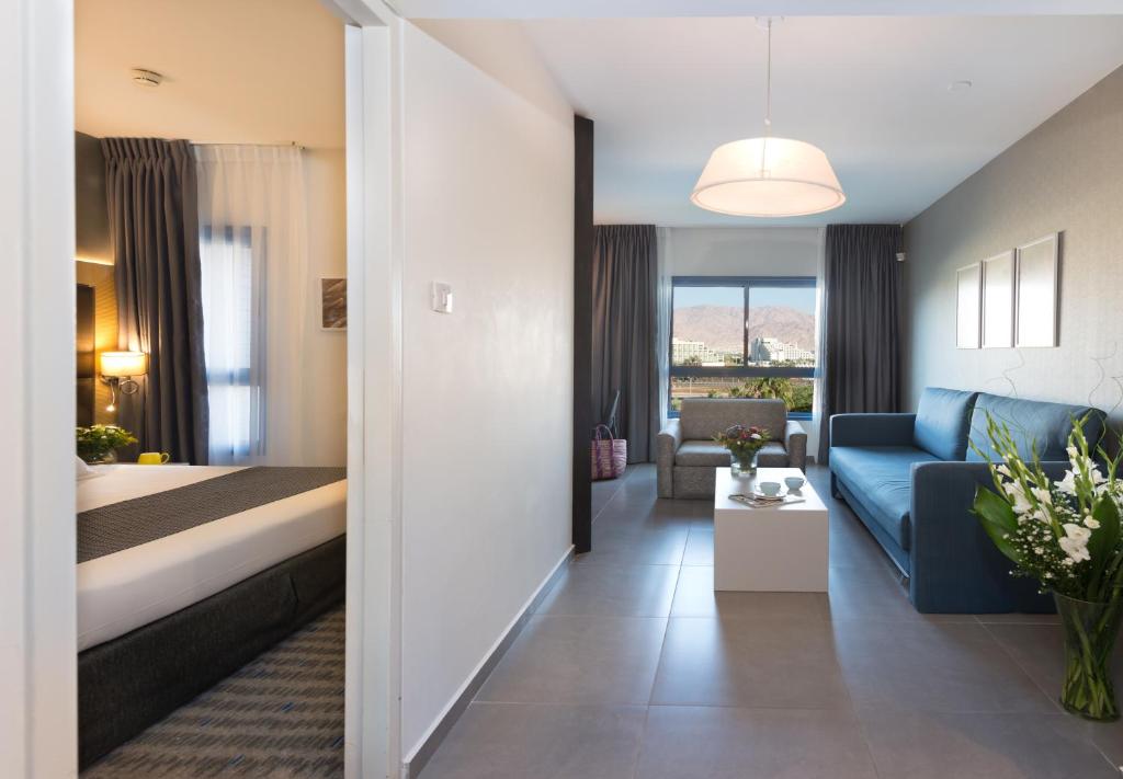 Ein Bett oder Betten in einem Zimmer der Unterkunft Hotel Astral Nirvana Club- Half Board