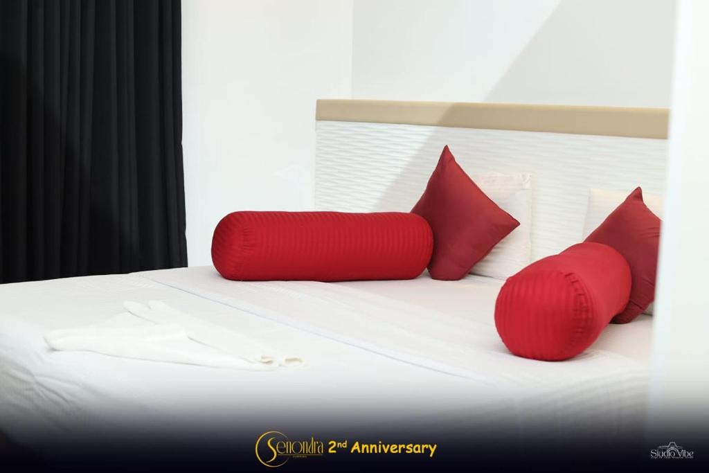 Postel nebo postele na pokoji v ubytování Hotel Senondra Ampara