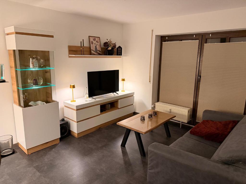 Et tv og/eller underholdning på Komfortable moderne Ferienwohnung 43 qm