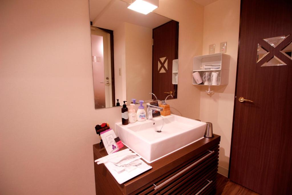 Koupelna v ubytování HOTEL ATLAS Shinkabukicho (Adult Only)