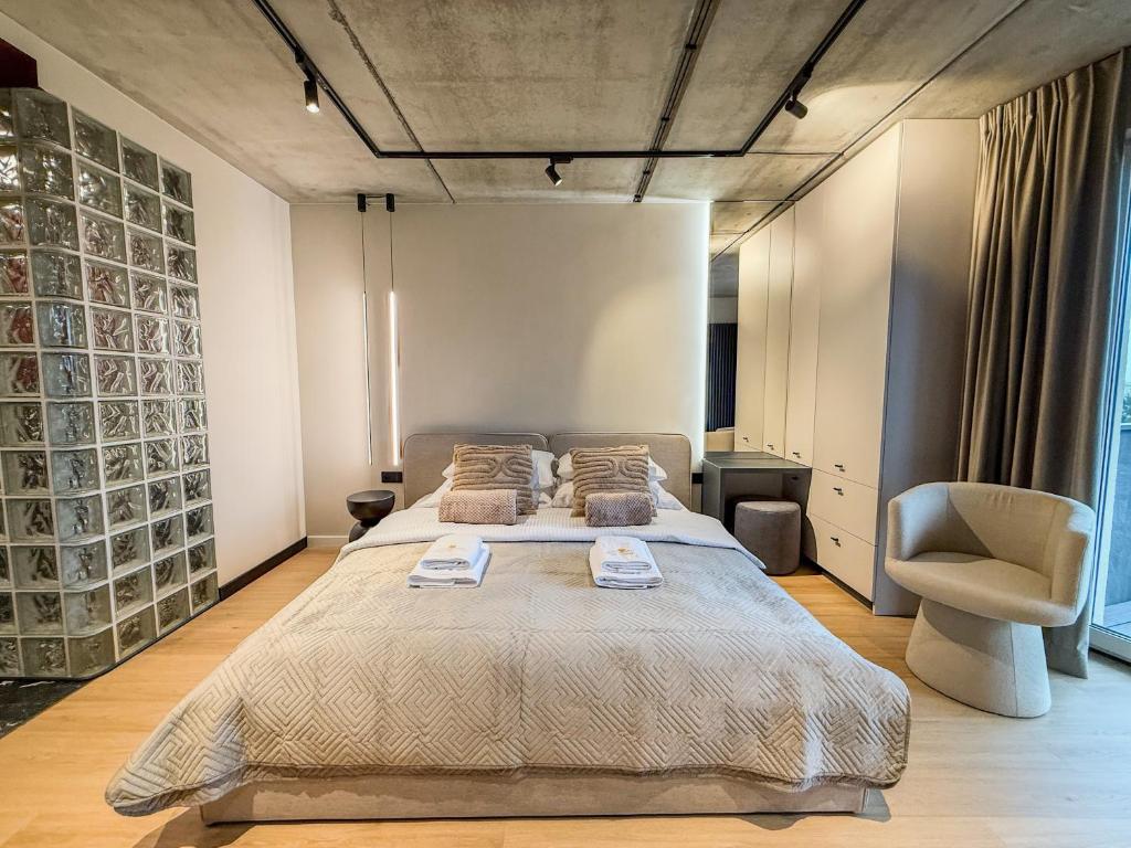 En eller flere senge i et værelse på Modern Apartment Gdańsk Luxury Stay