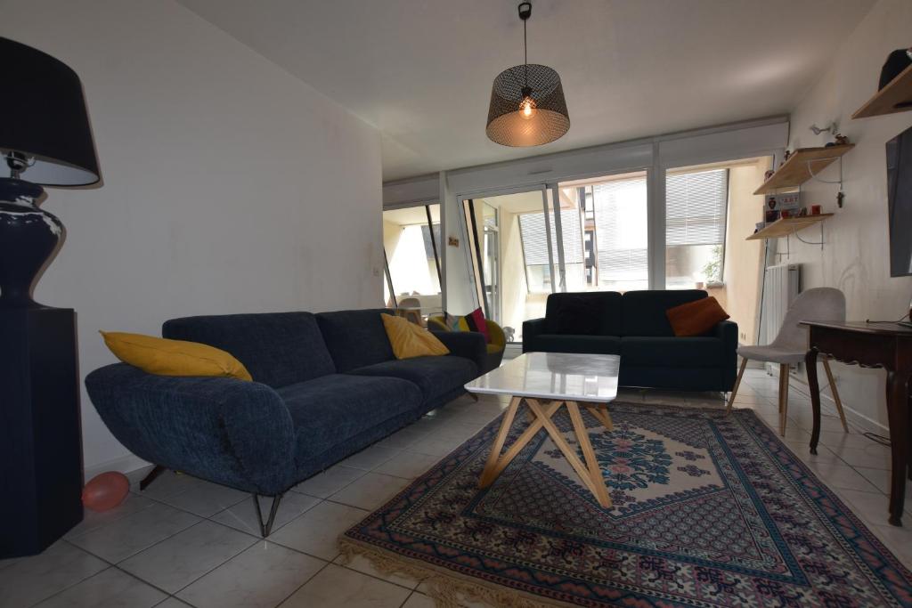 Khu vực ghế ngồi tại Appartement SANNOIS