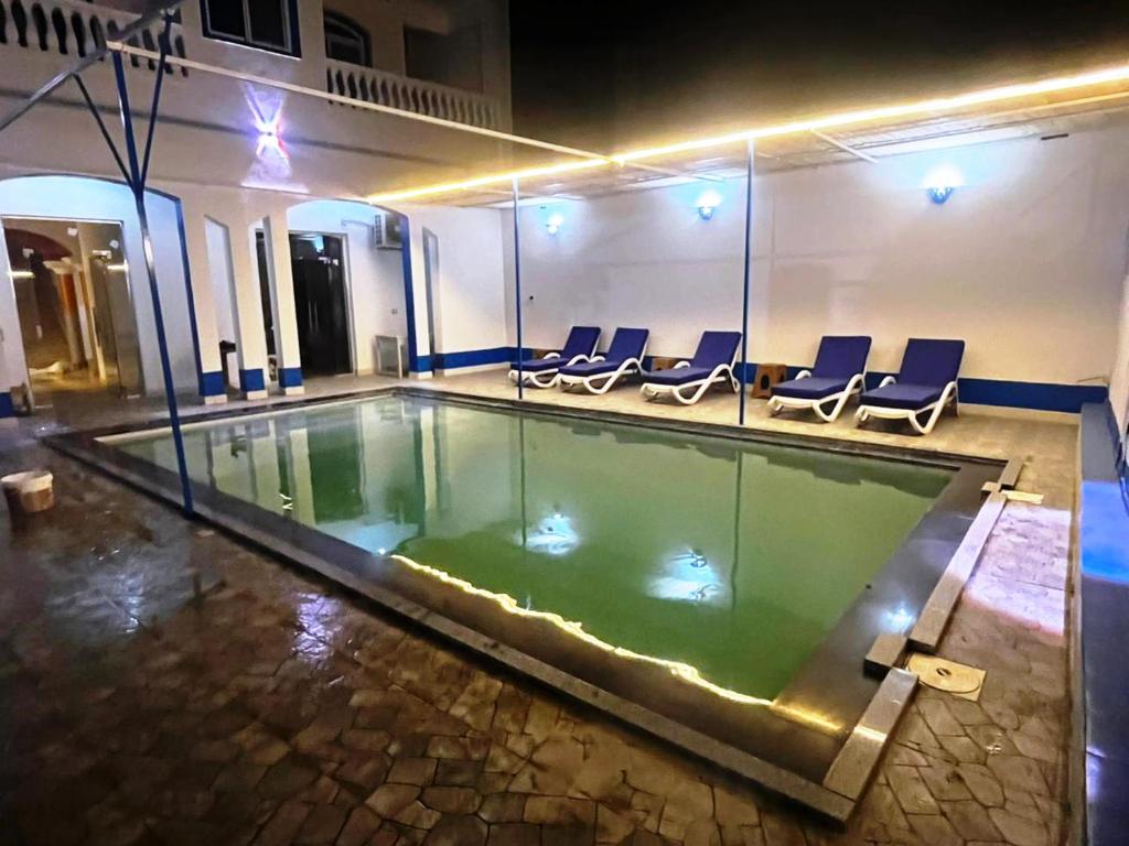 Swimmingpoolen hos eller tæt på Ali Baba Guest House