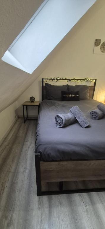 En eller flere senge i et værelse på T2 Cosy - Coeur Amiens