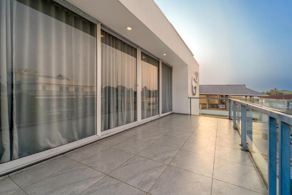 Μπαλκόνι ή βεράντα στο G Square 1 Room with Private Balcony Near Alappuzha Beach & Other Popular Attractions