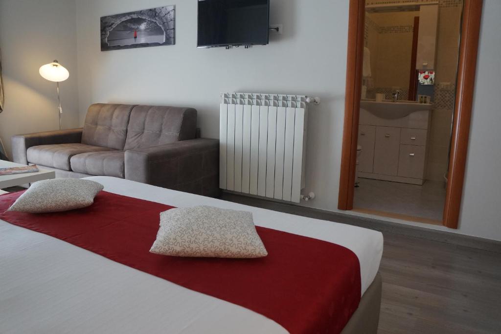 Postel nebo postele na pokoji v ubytování B&B Peschici 4 Stagioni