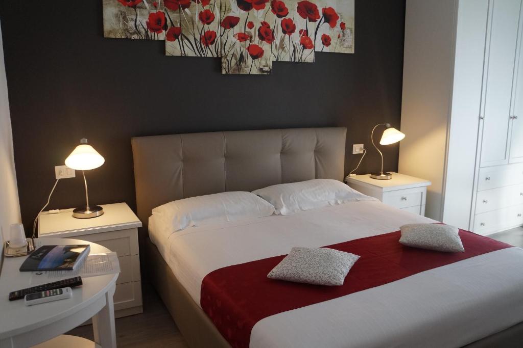 Postel nebo postele na pokoji v ubytování B&B Peschici 4 Stagioni