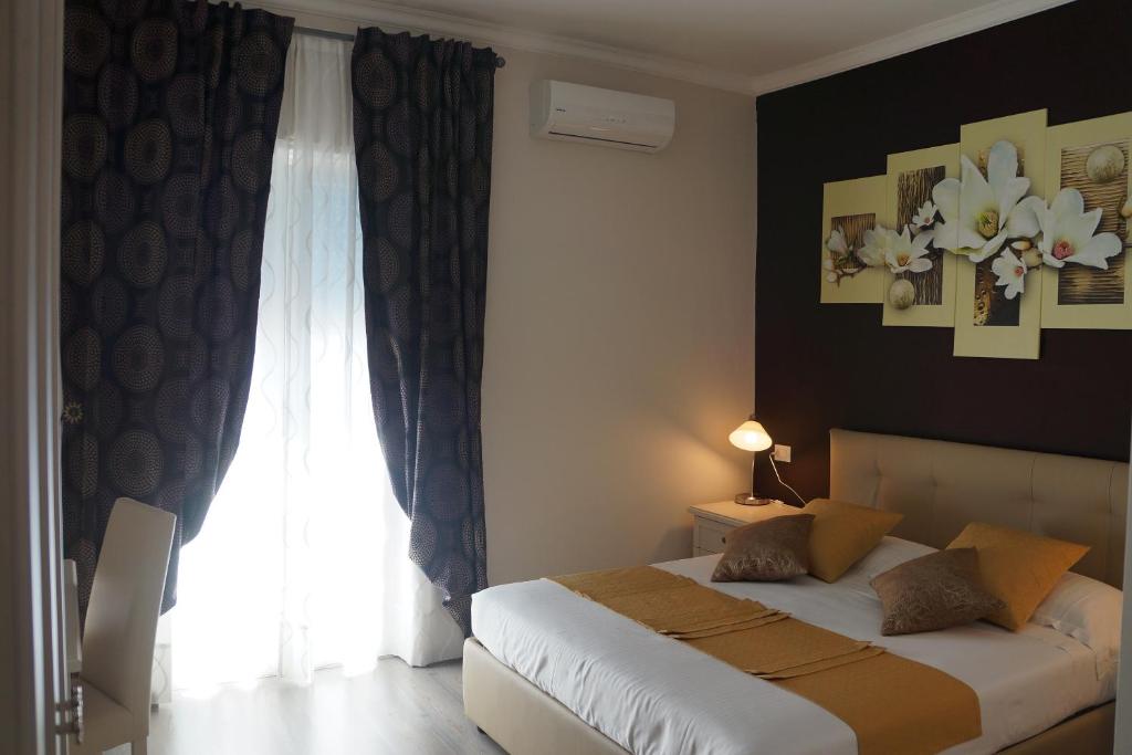 Postel nebo postele na pokoji v ubytování B&B Peschici 4 Stagioni