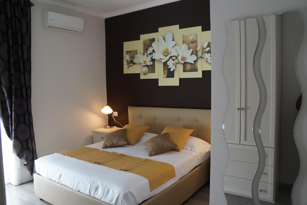 Postel nebo postele na pokoji v ubytování B&B Peschici 4 Stagioni