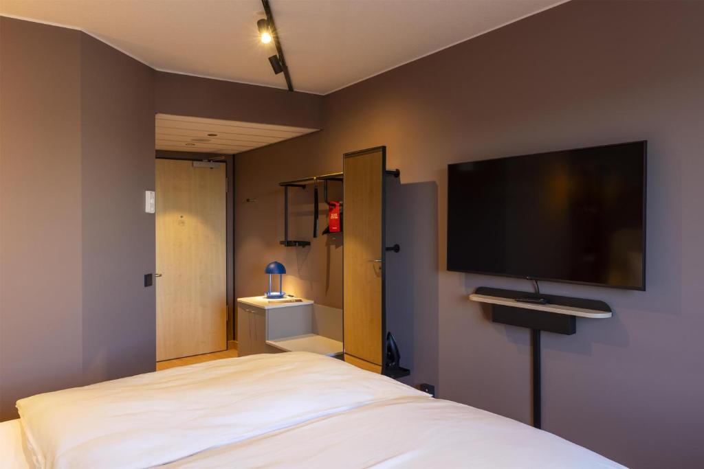 TV a/nebo společenská místnost v ubytování Scandic Stuttgart Europaviertel