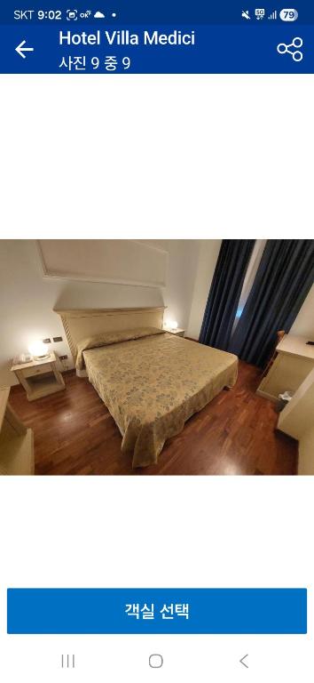 una camera da letto con un letto in una stanza di Hotel villa madici a Ulsan