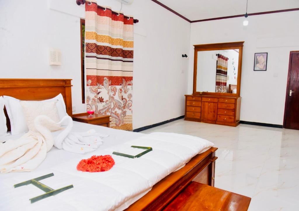 Postel nebo postele na pokoji v ubytování Harmony Village Villa