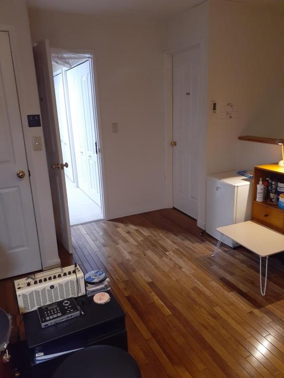 Posezení v ubytování ゲストハウス苫小牧201号室